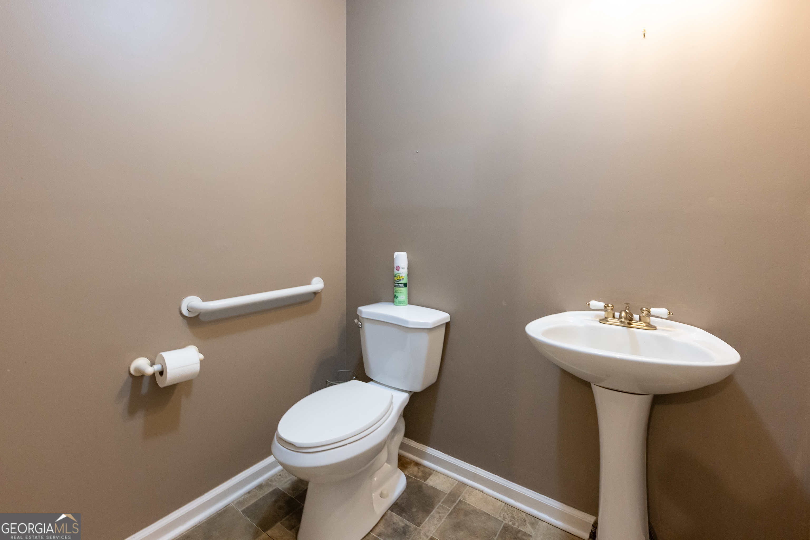 124 David Drive Thomaston, GA 30286 - Photo 15 of 43 a bathroom with a sink toilet and a mirror
