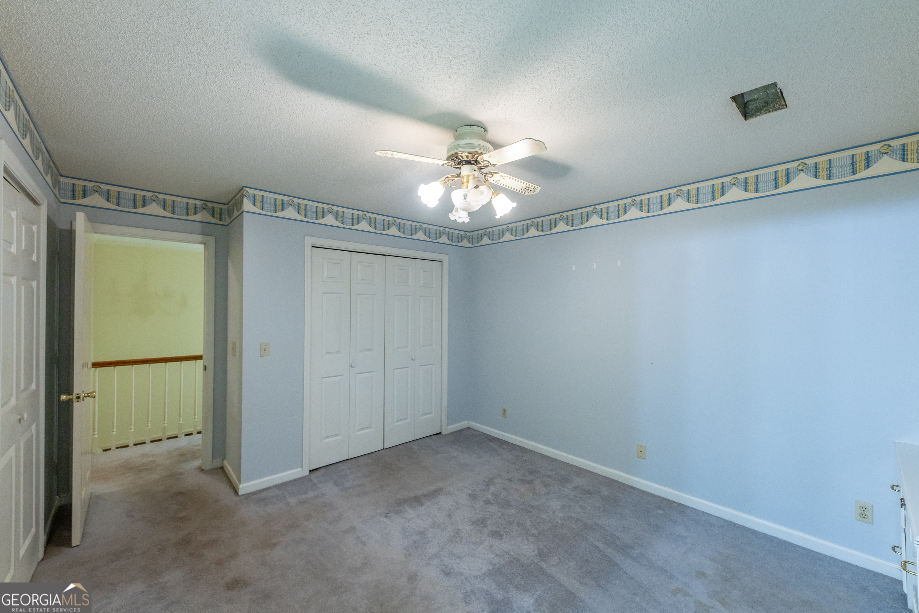 124 David Drive Thomaston, GA 30286 - Photo 21 of 43 a view of a chandelier in an empty room