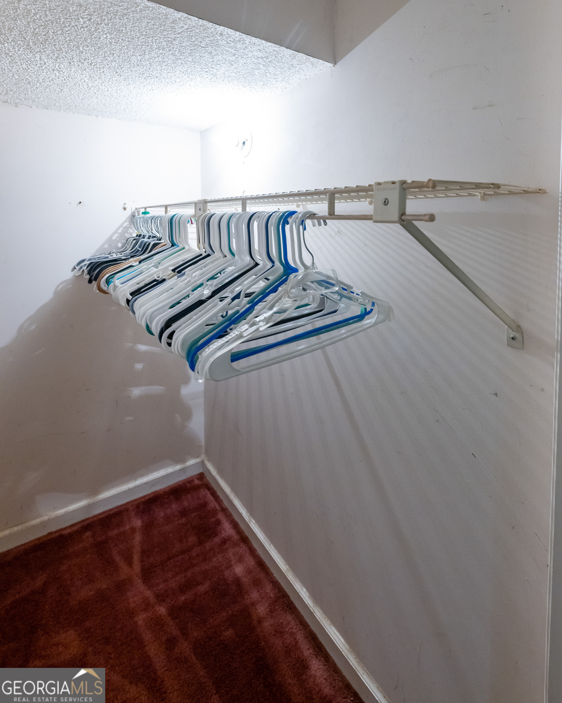 124 David Drive Thomaston, GA 30286 - Photo 25 of 43 a view of a room with racks on the wall
