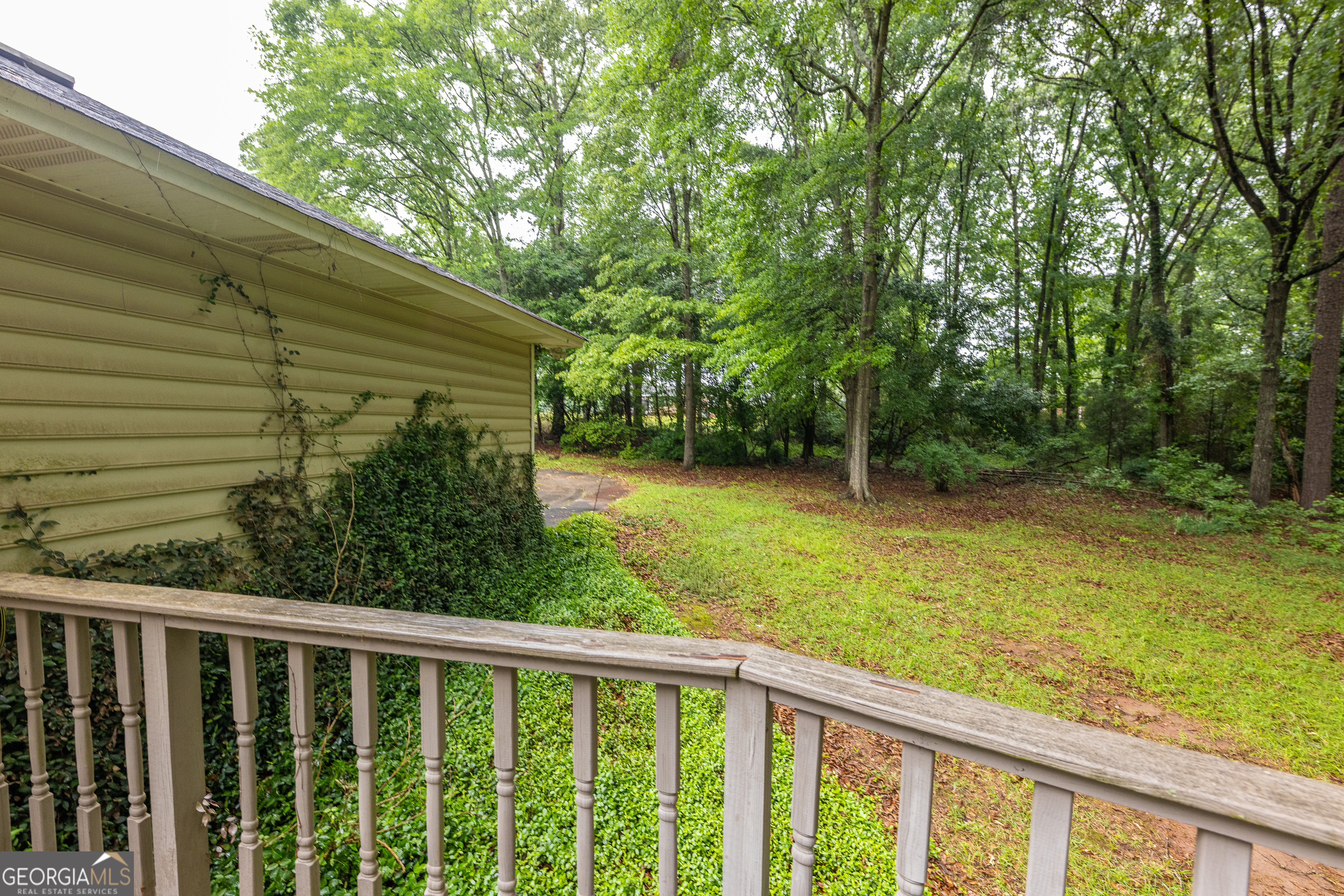 124 David Drive Thomaston, GA 30286 - Photo 26 of 43 a balcony with trees in front of it