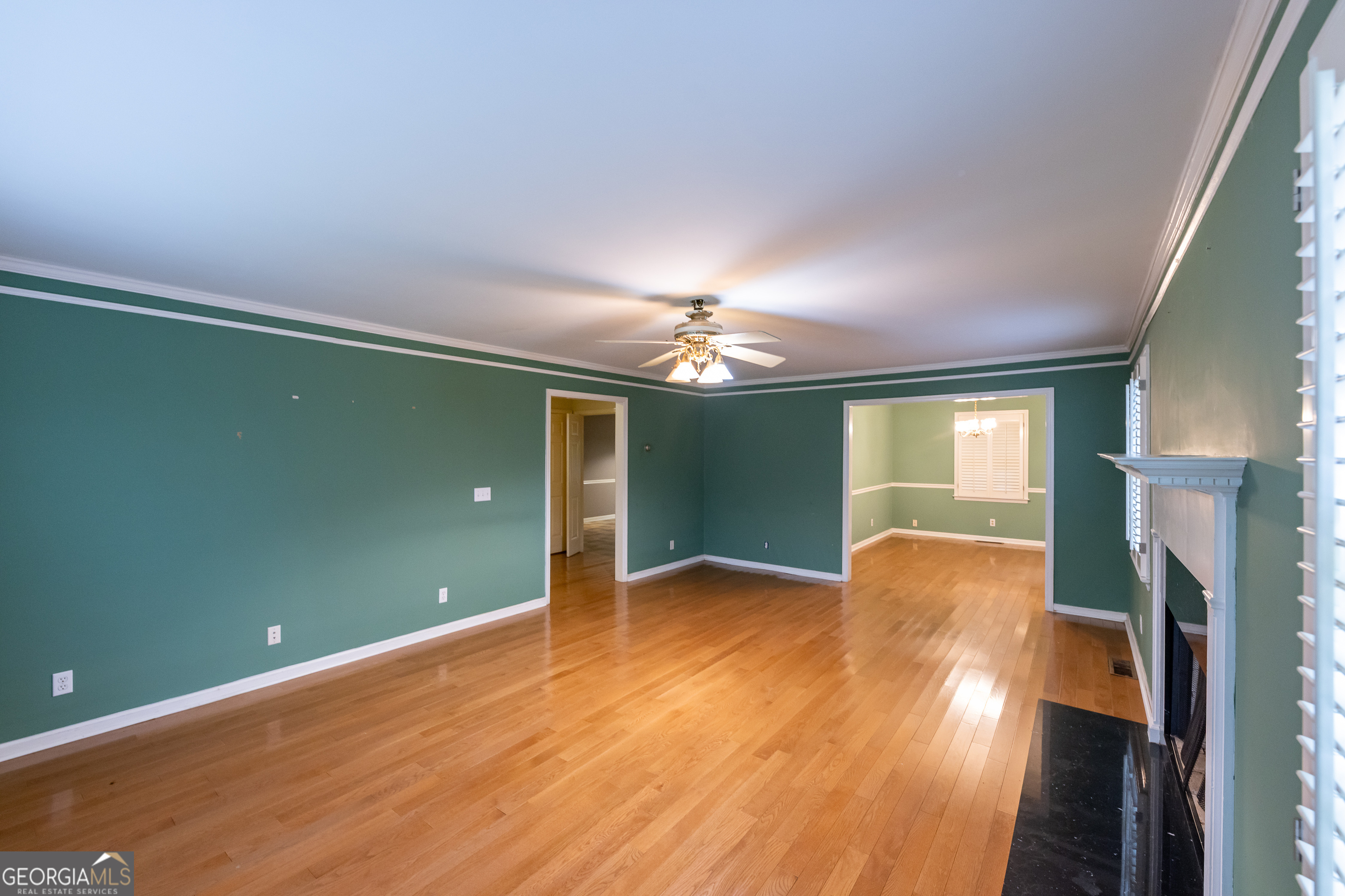 124 David Drive Thomaston, GA 30286 - Photo 6 of 43 wooden floor in an empty room with a window