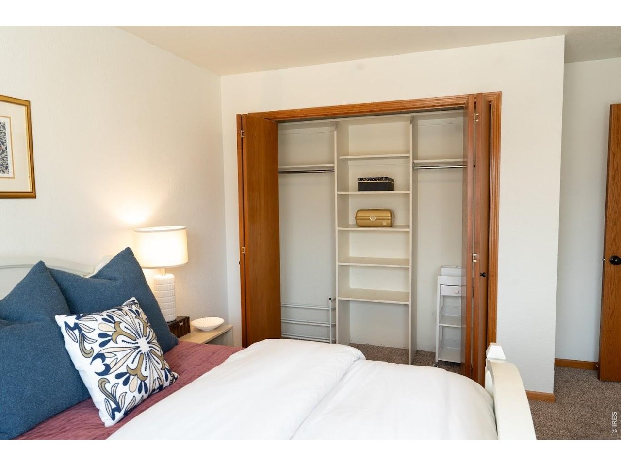 539 South 9th Street Berthoud, CO 80513 - Photo 17 of 37 a bedroom with a bed and a dresser