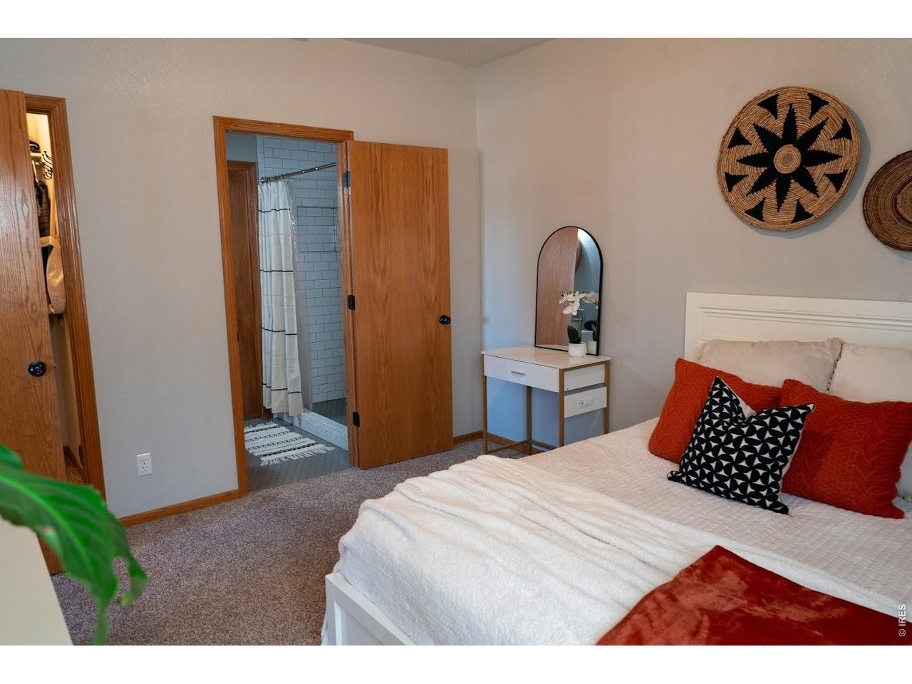 539 South 9th Street Berthoud, CO 80513 - Photo 19 of 37 a bedroom with a bed and a table