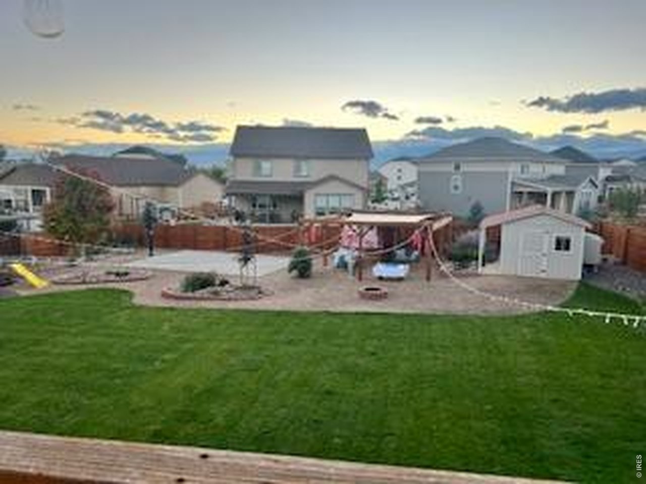 539 South 9th Street Berthoud, CO 80513 - Photo 31 of 37 a view of a house with a yard