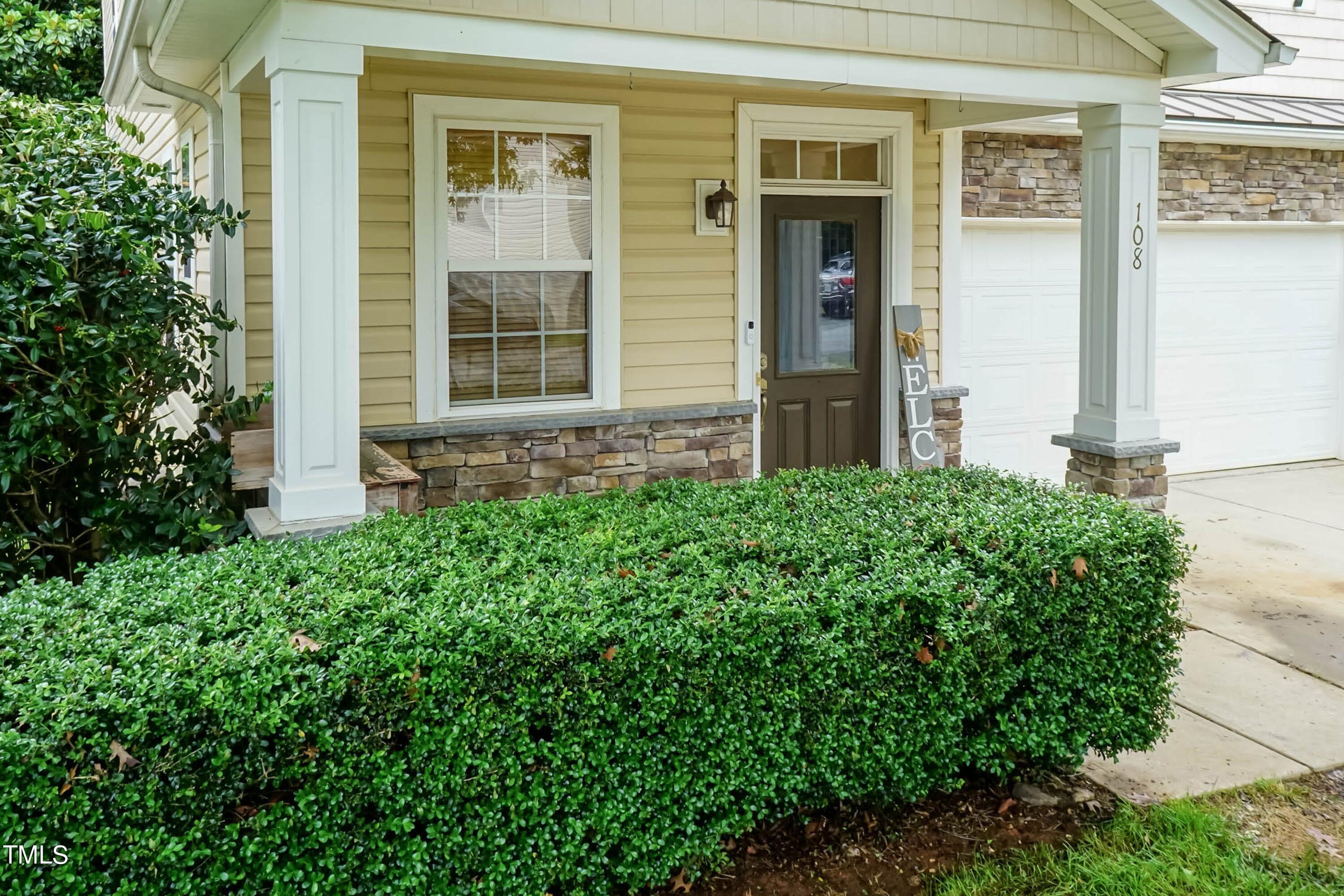 108 Solheim Lane Raleigh, NC 27603 - Photo 6 of 49 a view of front door of house and yard