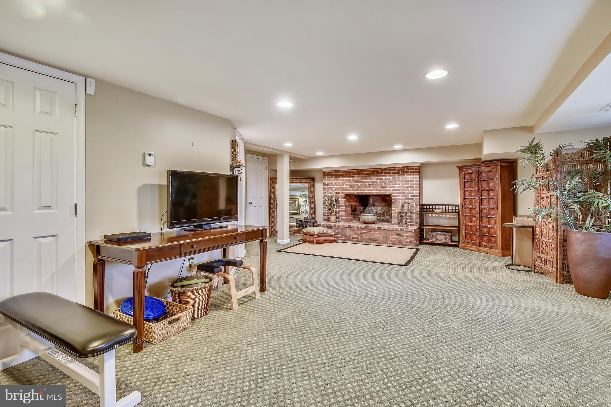 8325 Bensville Road Waldorf, MD 20603 - Photo 54 of 88 Lower Level Recreation Room with Fireplace