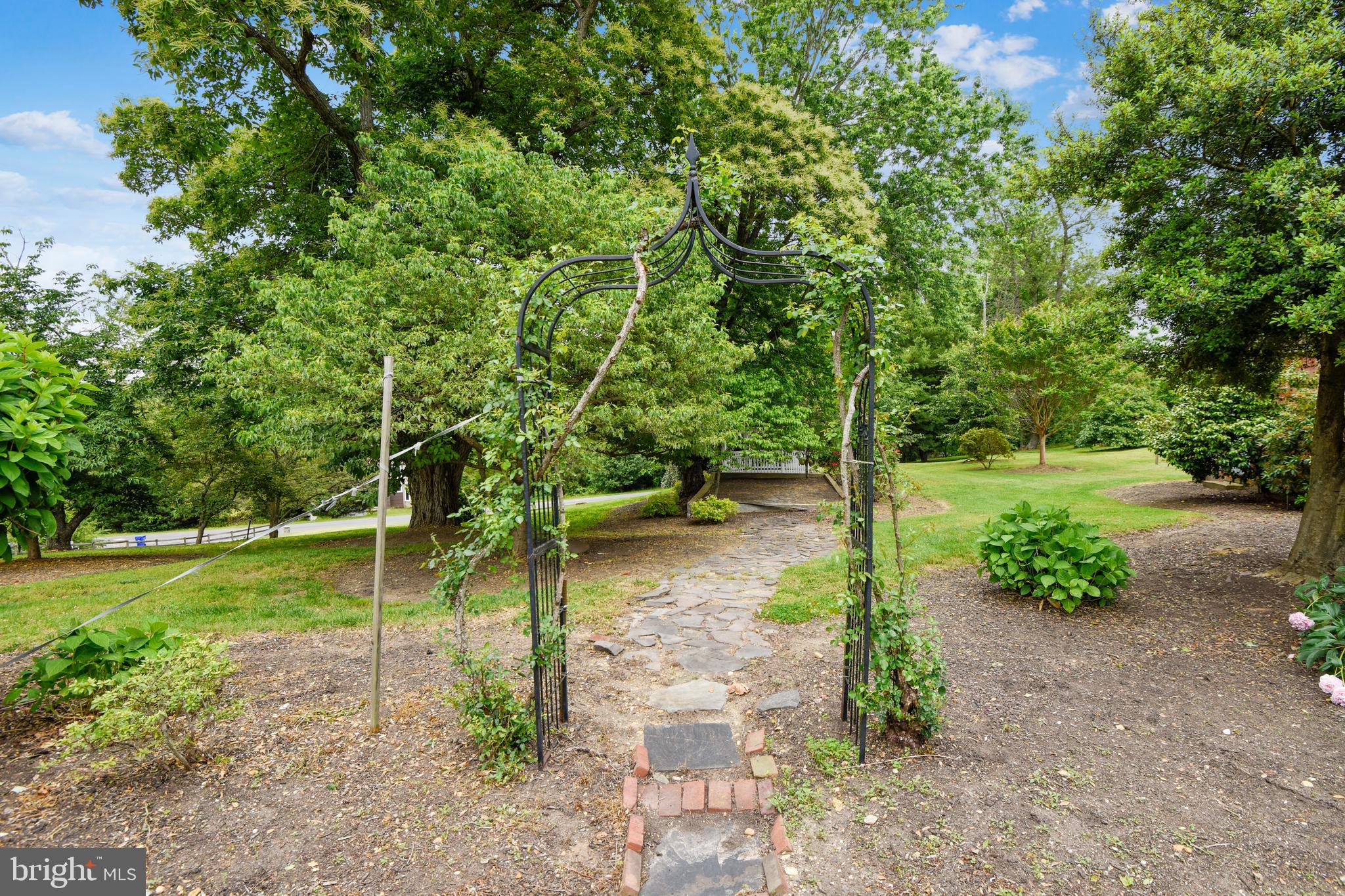 8325 Bensville Road Waldorf, MD 20603 - Photo 69 of 88 Delightful walk through rose trellis to gazebo