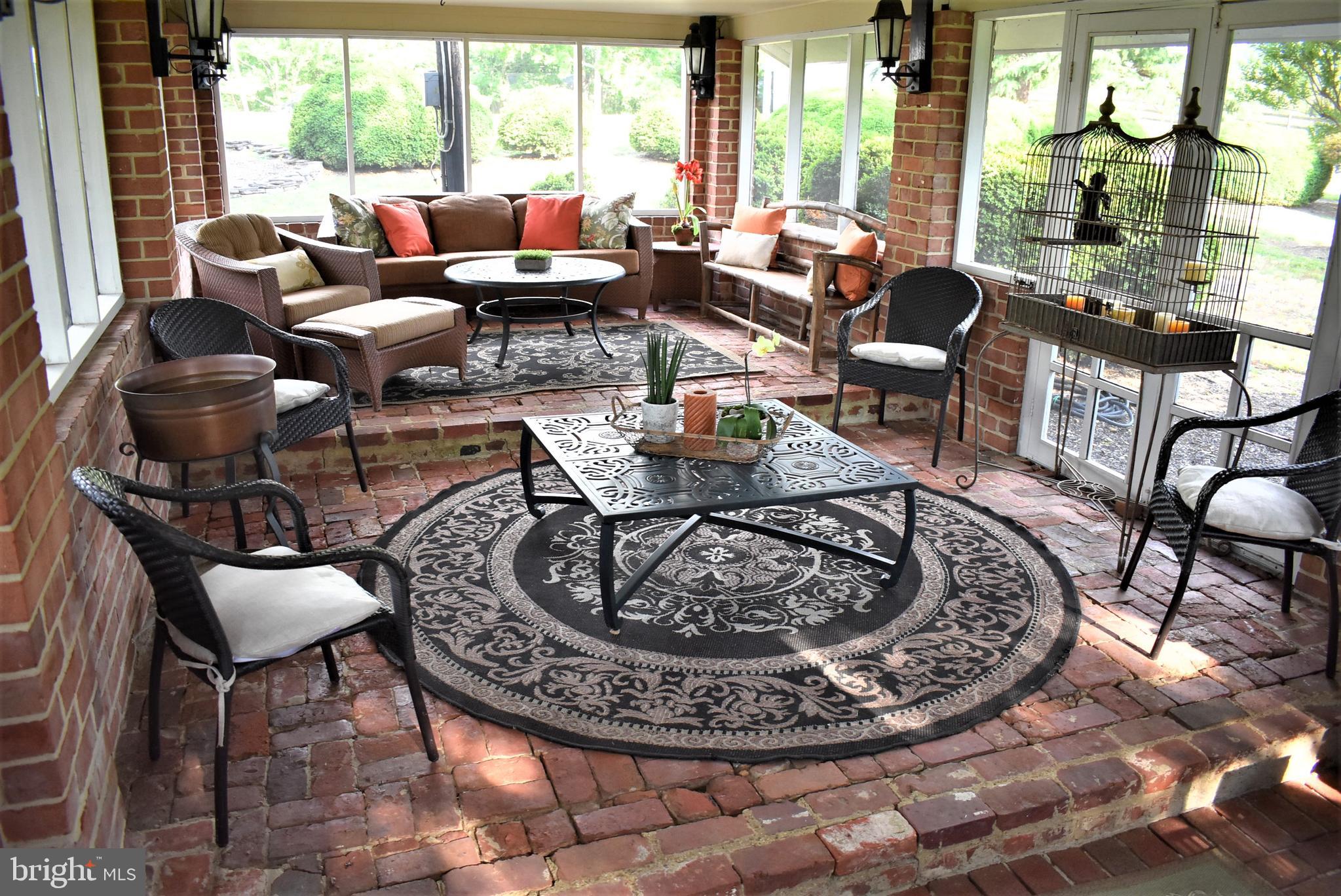 8325 Bensville Road Waldorf, MD 20603 - Photo 71 of 88 Screened sheltered entertainment area, brick floor