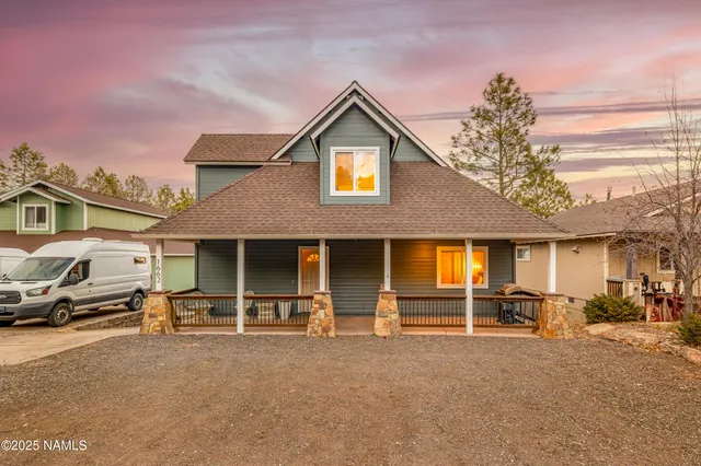 a view of a car park in front of house