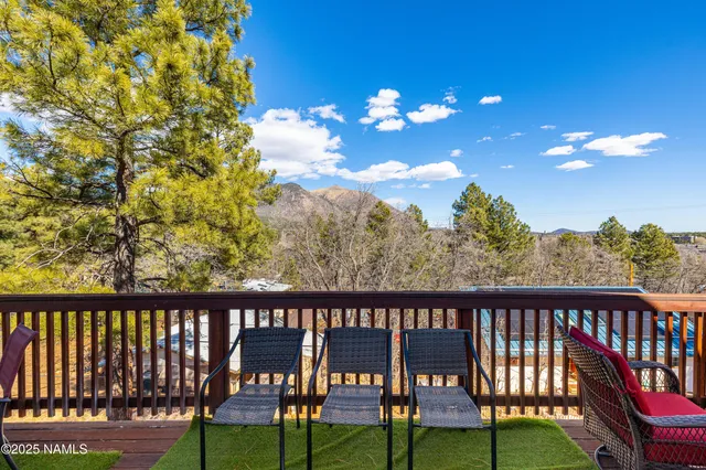 a view of a porch with a yard