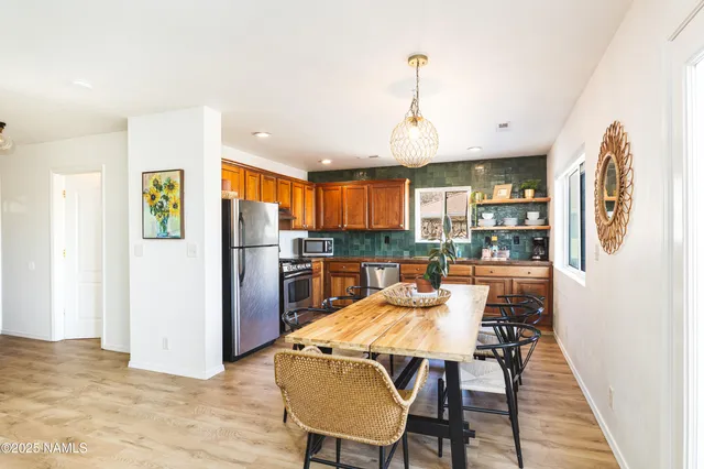 a view of a dining room with furniture