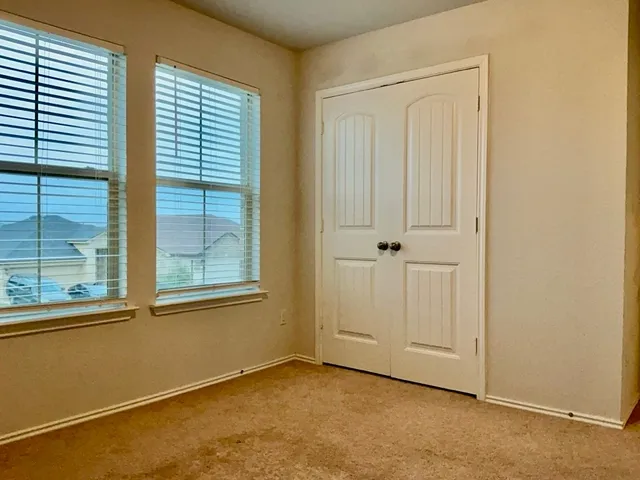 an empty room with window