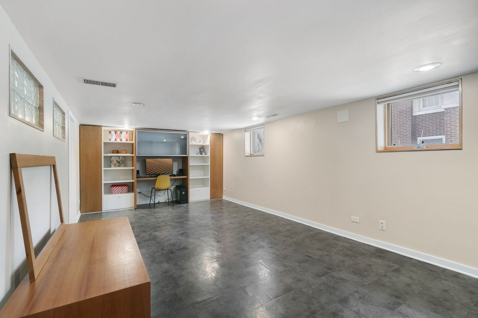 248 Gage Road Riverside, IL 60546 - Photo 15 of 28 a living room with furniture and a flat screen tv