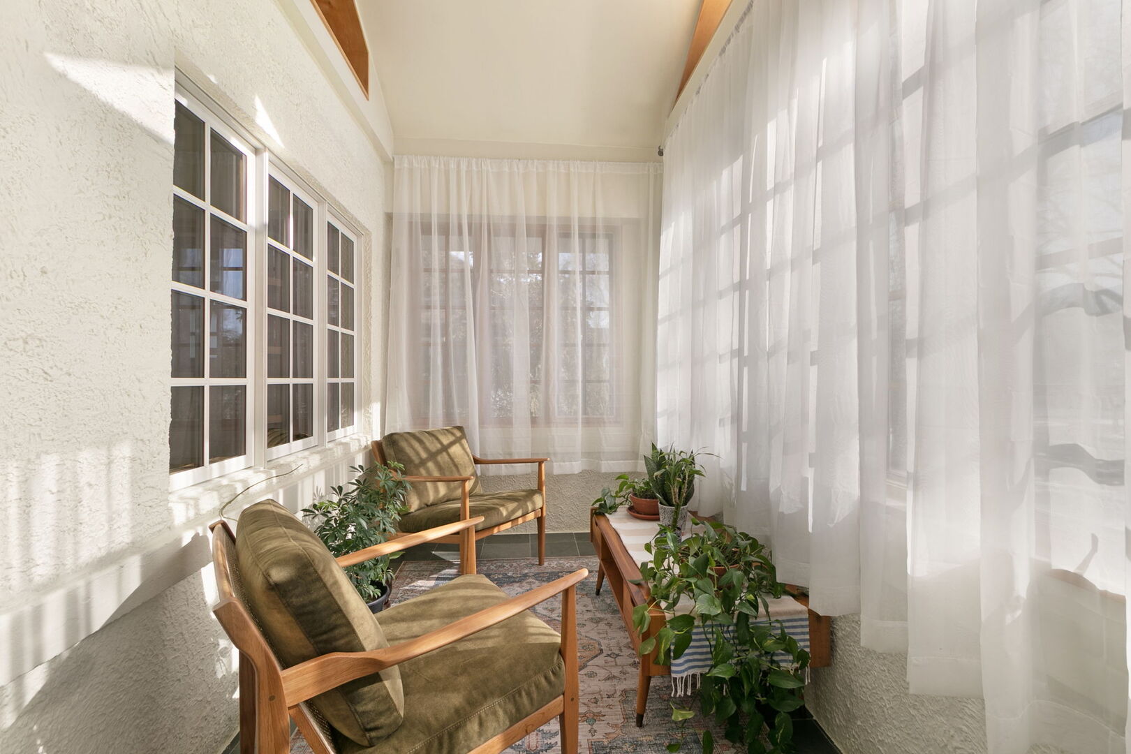 248 Gage Road Riverside, IL 60546 - Photo 17 of 28 a living room with furniture and a potted plant