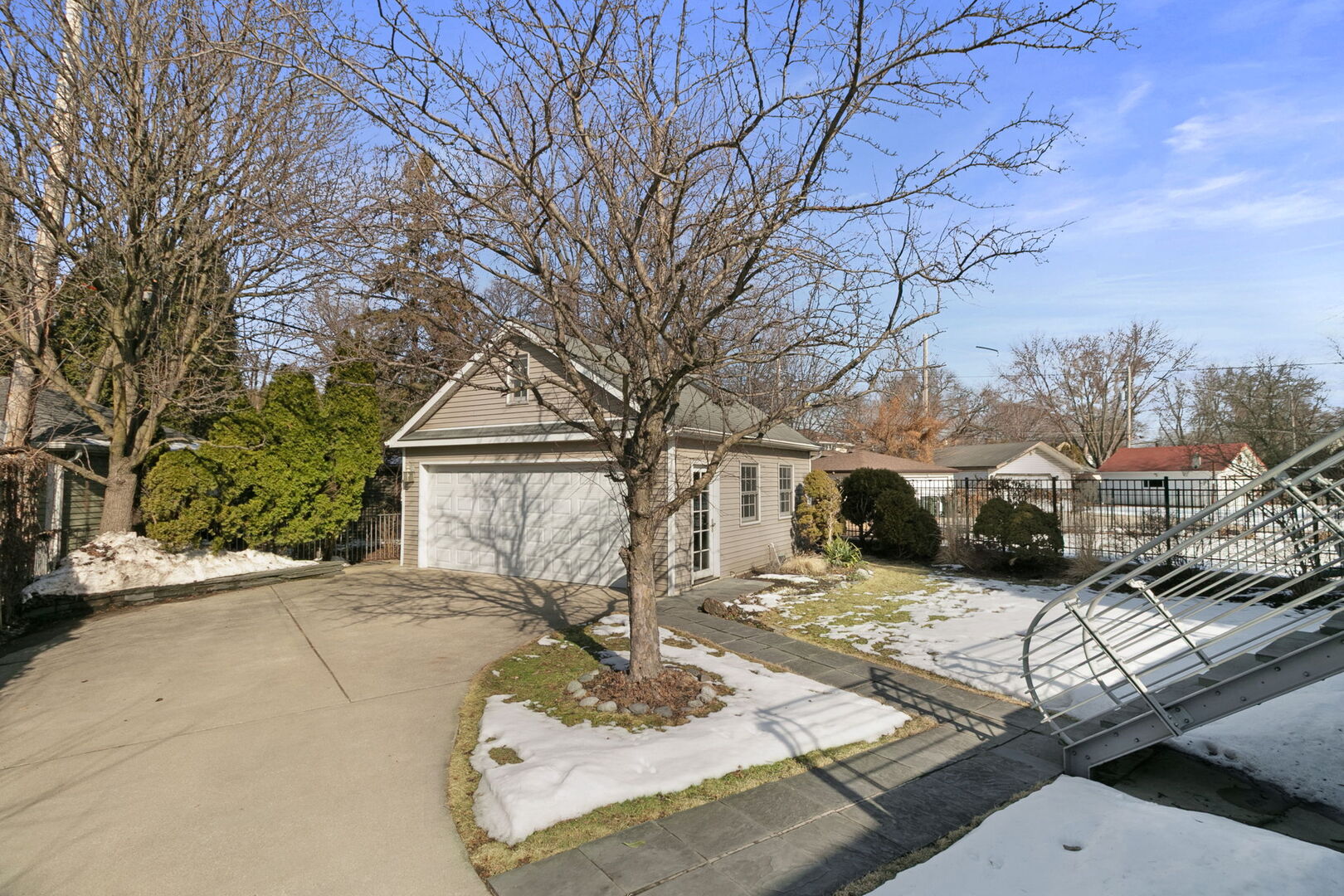 248 Gage Road Riverside, IL 60546 - Photo 20 of 28 a view of a house with a yard covered in snow