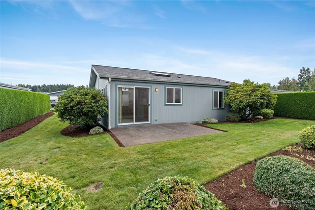 a house view with a garden space