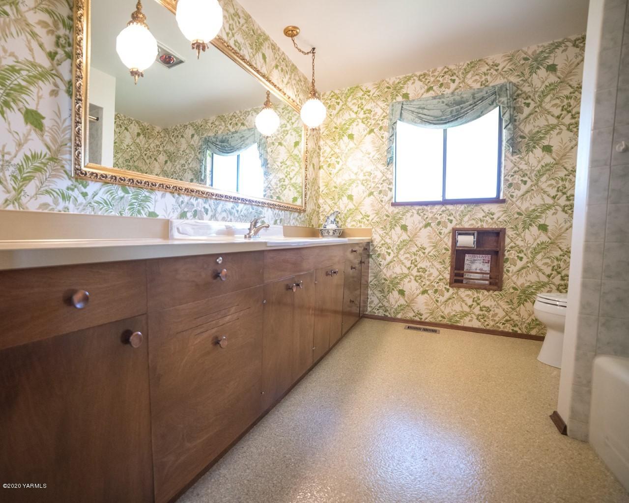 8540-2 Fort Road Wapato, WA 98951 - Photo 20 of 55 a view of a bathroom with a sink and a mirror