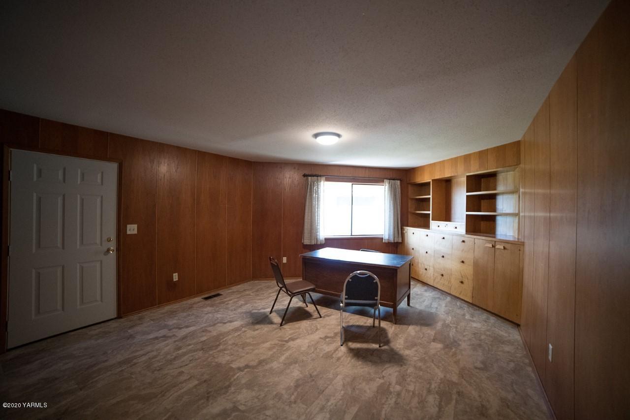 8540-2 Fort Road Wapato, WA 98951 - Photo 26 of 55 a view of work space with wooden floor and furniture