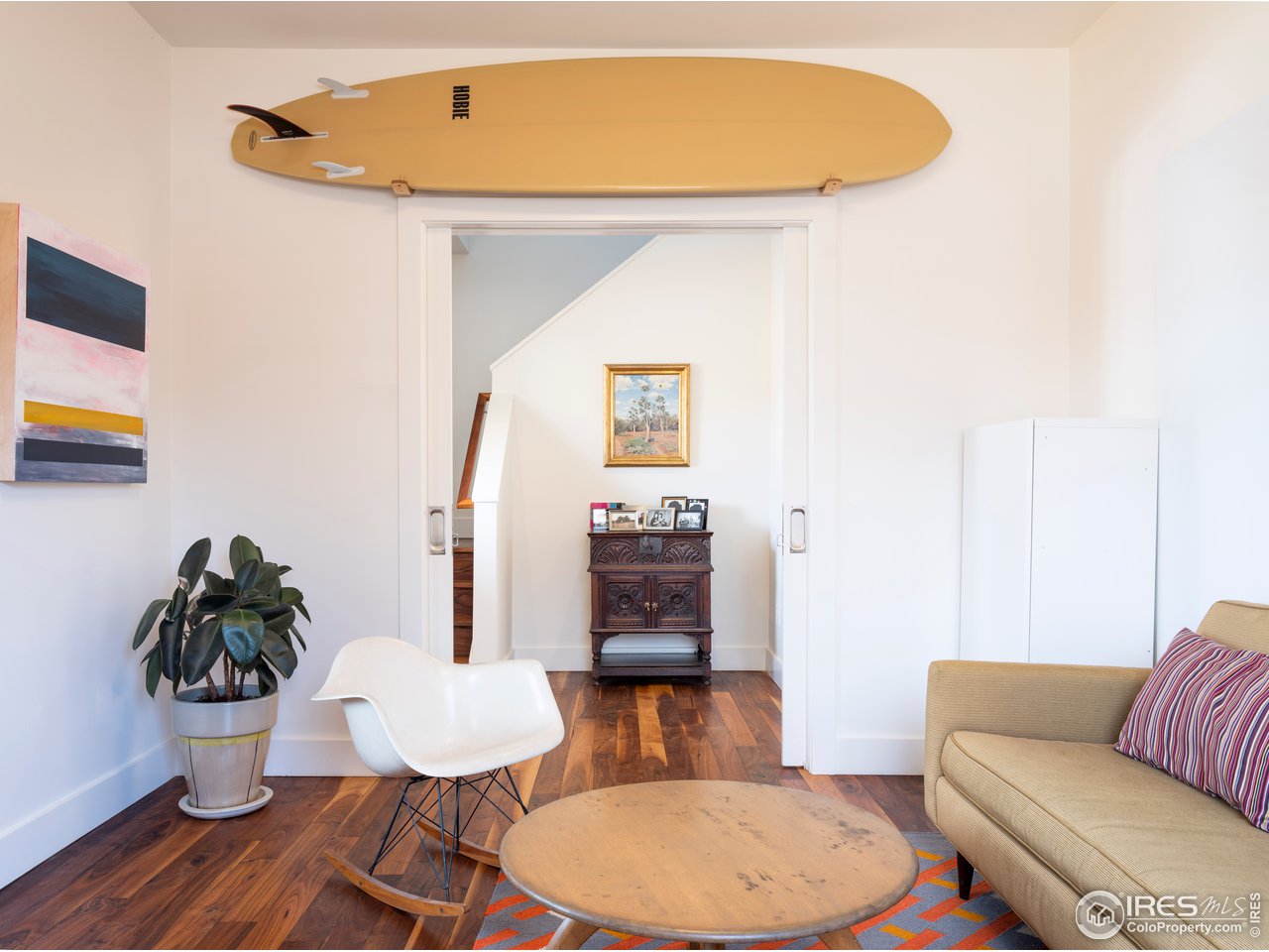 704 Concord Avenue Boulder, CO 80304 - Photo 13 of 27 a living room with furniture and a wooden floor