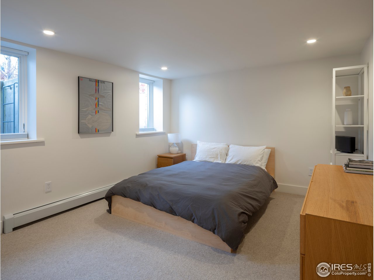704 Concord Avenue Boulder, CO 80304 - Photo 26 of 27 a bedroom with a bed and a couch