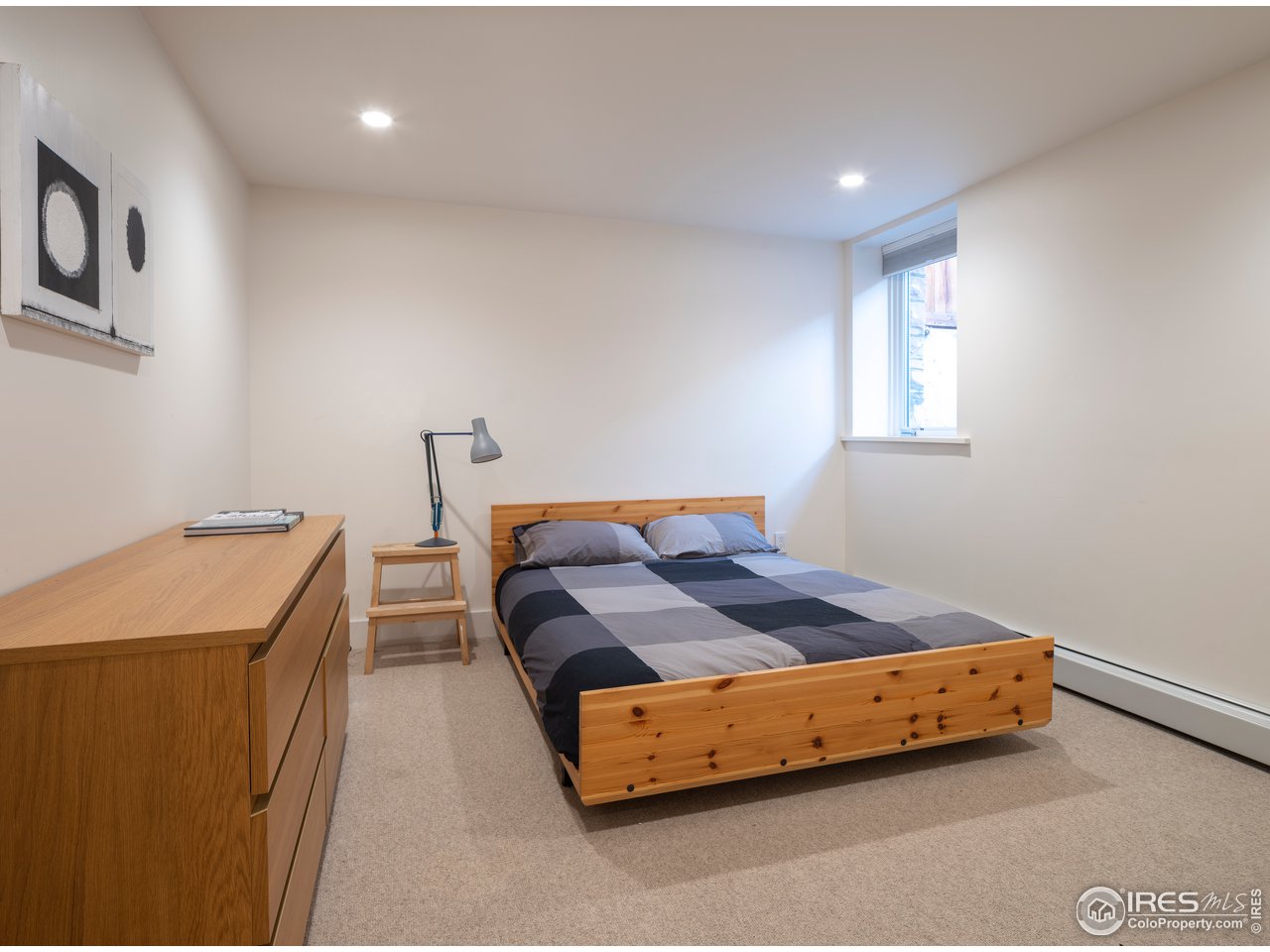 704 Concord Avenue Boulder, CO 80304 - Photo 27 of 27 a bedroom with a bed and window