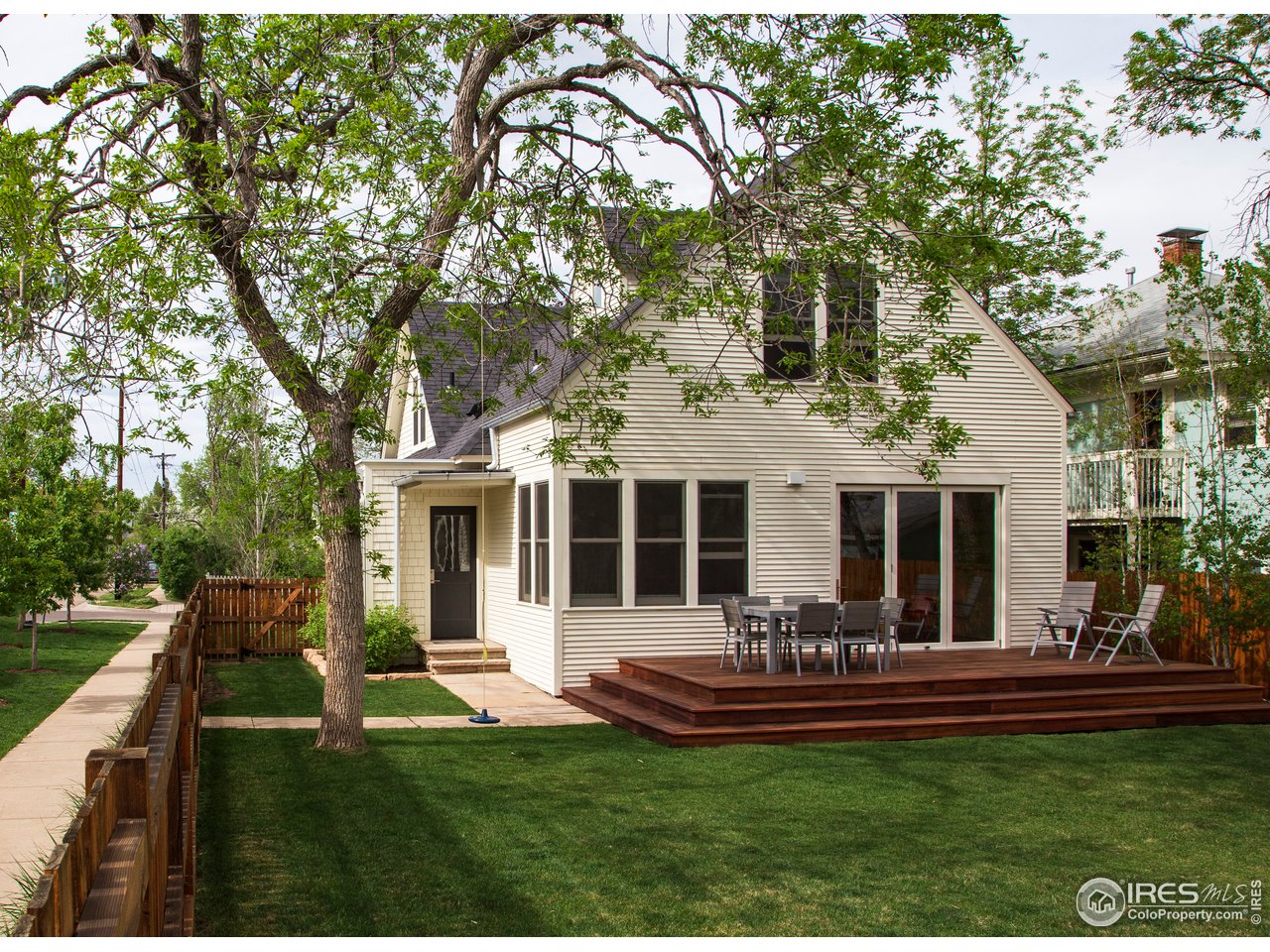 704 Concord Avenue Boulder, CO 80304 - Photo 3 of 27 a view of a house with a backyard porch and sitting area