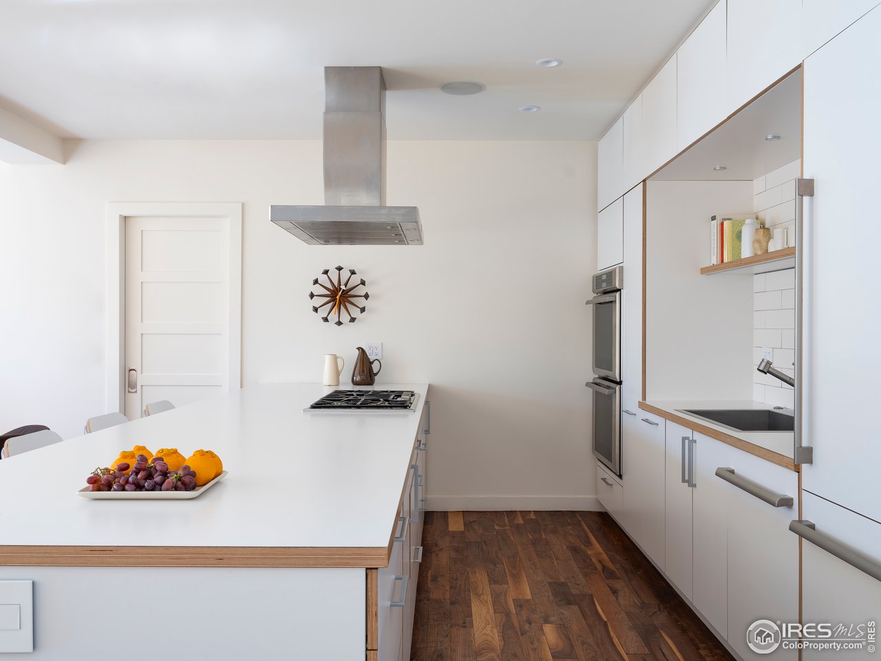 704 Concord Avenue Boulder, CO 80304 - Photo 9 of 27 a kitchen with stainless steel appliances a refrigerator and a stove