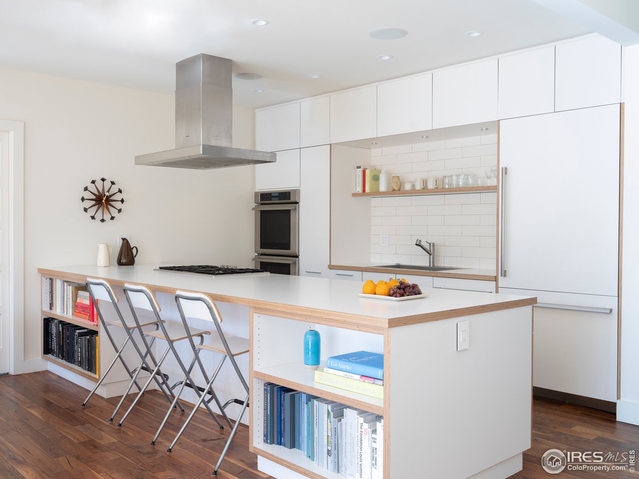 704 Concord Avenue Boulder, CO 80304 - Photo 10 of 27 a utility room with stainless steel appliances a stove and a refrigerator