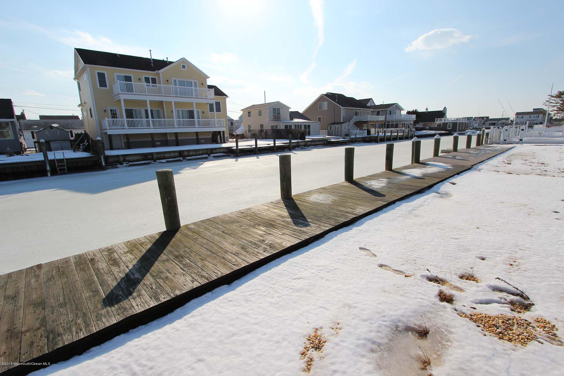 219 South Lagoon Road Lavallette, NJ 08735 - Photo 4 of 4 a view of swimming pool with outdoor seating