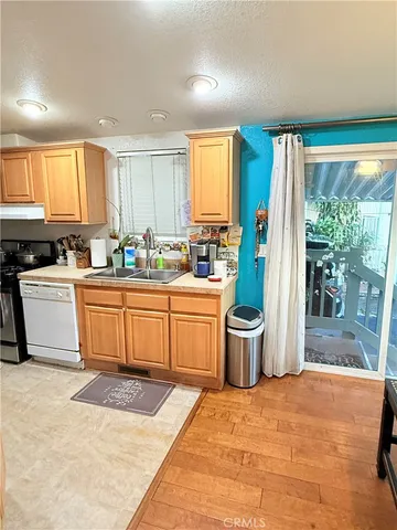 a living room with a bed and a table