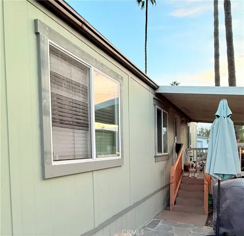 a view of front door and bedroom