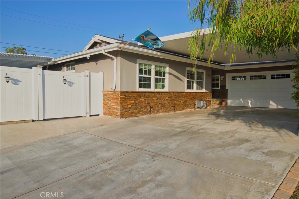 6091 Dundee Drive Huntington Beach, CA 92647 - Photo 3 of 55 a view of house with a outdoor space