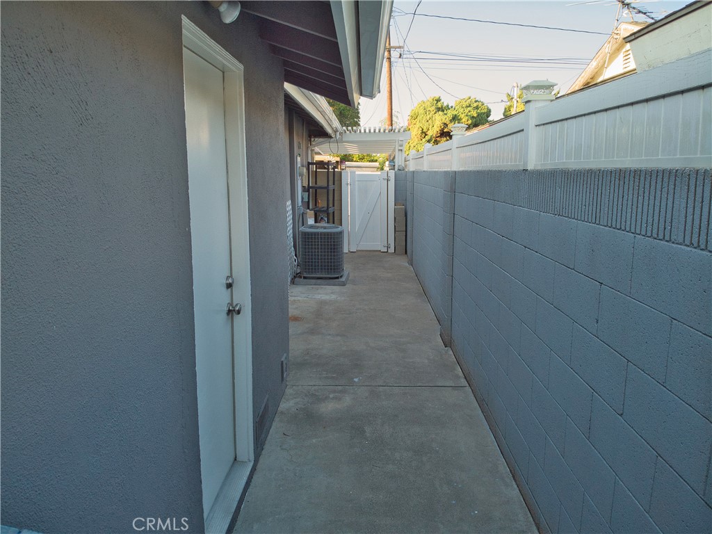 6091 Dundee Drive Huntington Beach, CA 92647 - Photo 54 of 55 a view of a pathway of a building