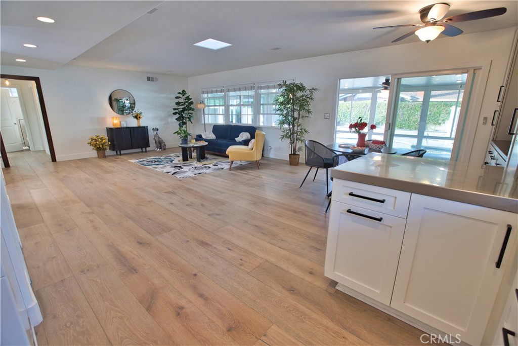 6091 Dundee Drive Huntington Beach, CA 92647 - Photo 8 of 55 a living room with furniture and a large window