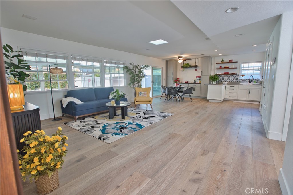 6091 Dundee Drive Huntington Beach, CA 92647 - Photo 10 of 55 a living room with furniture and a large window