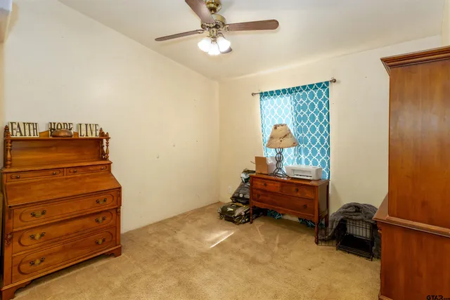 a room with furniture and a window