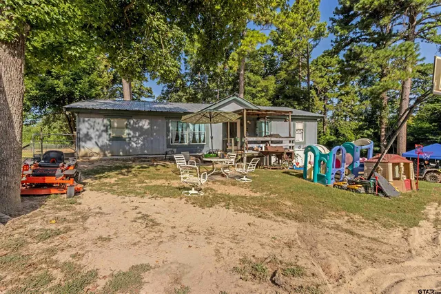 a view of a house with a patio