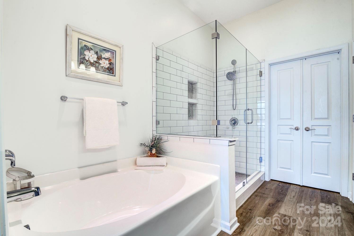 120 Falling Ridge Belmont, NC 28012 - Photo 12 of 18 a bathroom with a bathtub and a sink