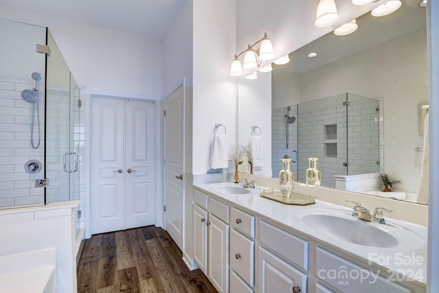 120 Falling Ridge Belmont, NC 28012 - Photo 14 of 18 a bathroom with a double vanity sink and a mirror