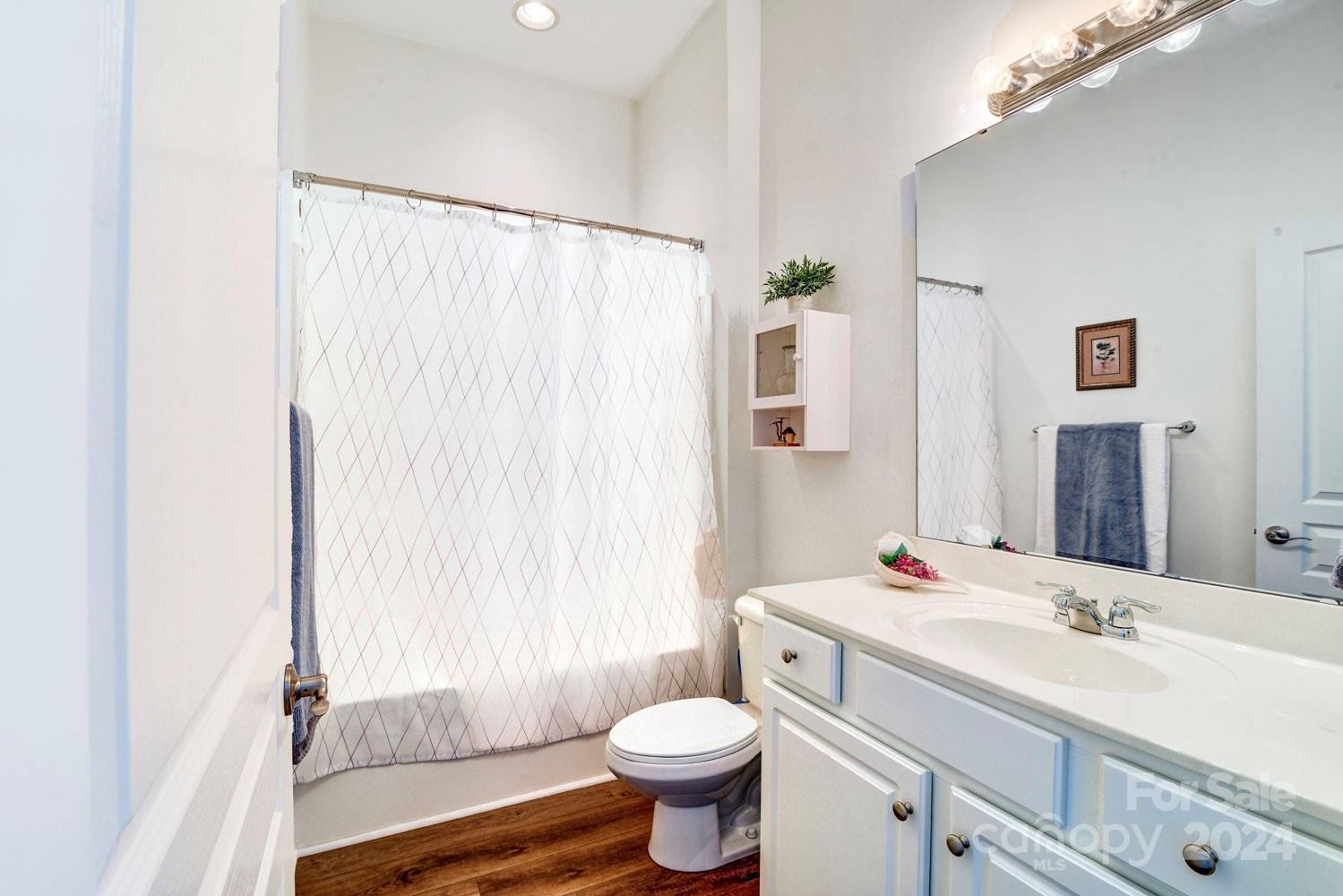 120 Falling Ridge Belmont, NC 28012 - Photo 17 of 18 a bathroom with a sink toilet and shower