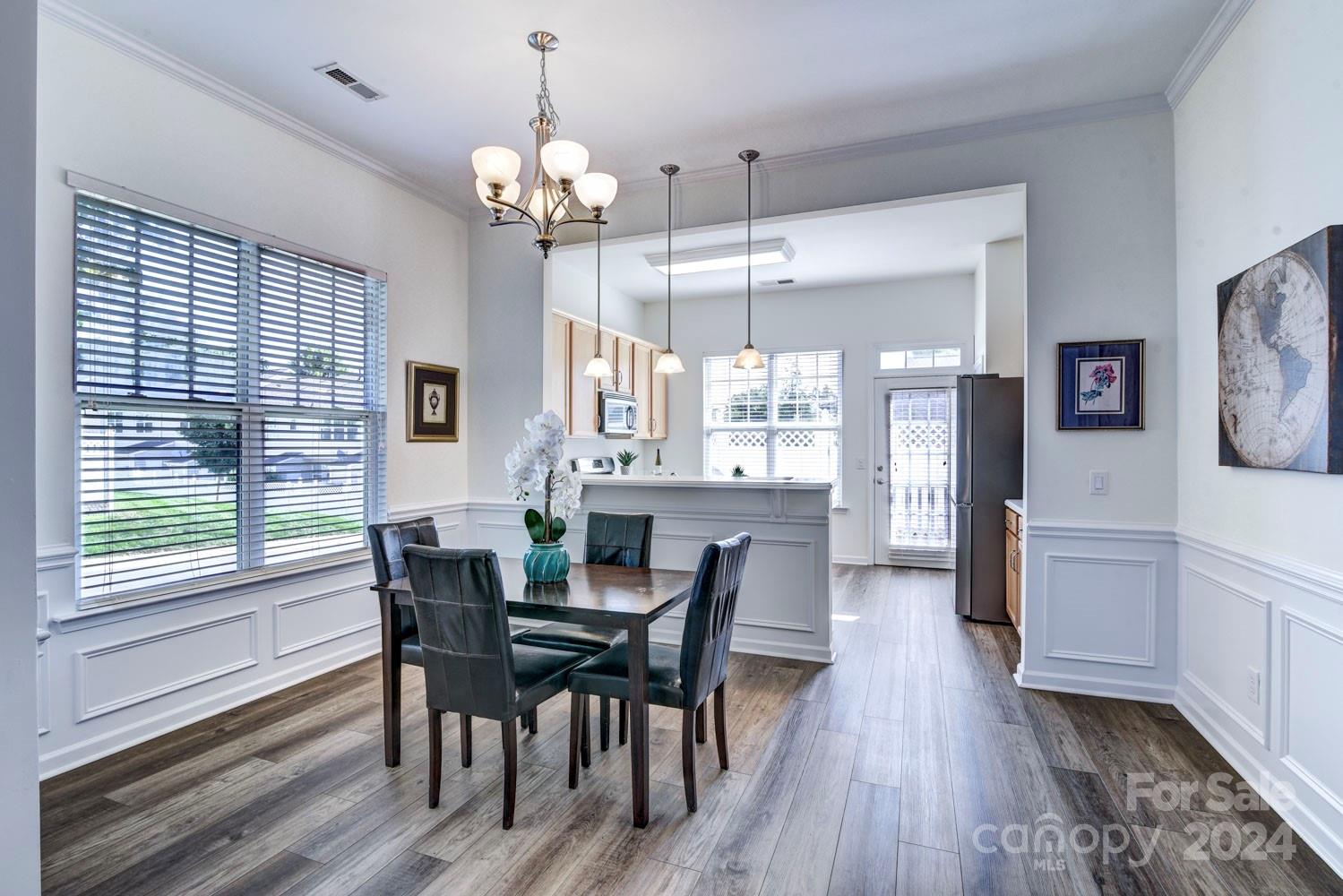 120 Falling Ridge Belmont, NC 28012 - Photo 5 of 18 a view of a dining room with furniture and chandelier