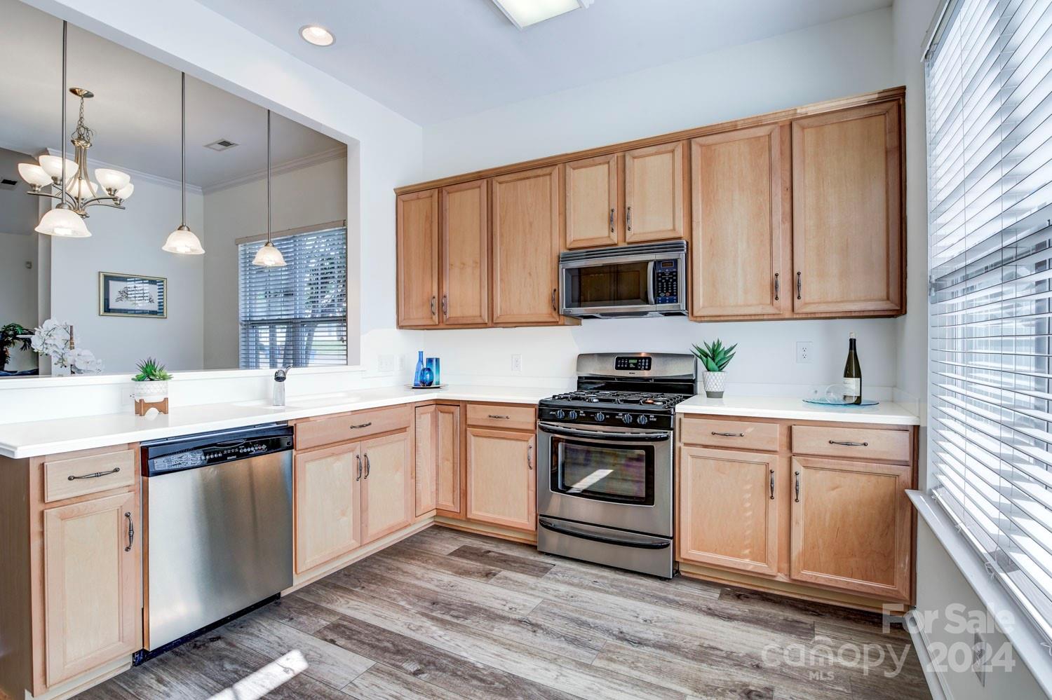 120 Falling Ridge Belmont, NC 28012 - Photo 8 of 18 a kitchen with a sink stove and microwave