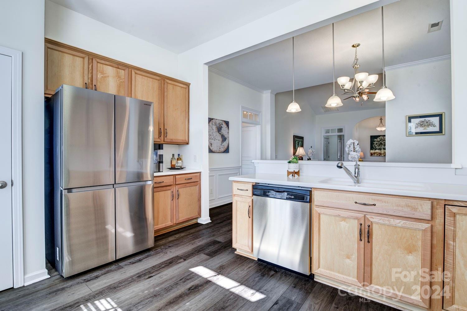 120 Falling Ridge Belmont, NC 28012 - Photo 9 of 18 a kitchen with white cabinets and stainless steel appliances
