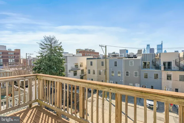 a view of a balcony with city view