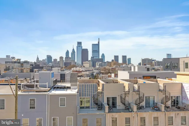 a view of city with tall buildings