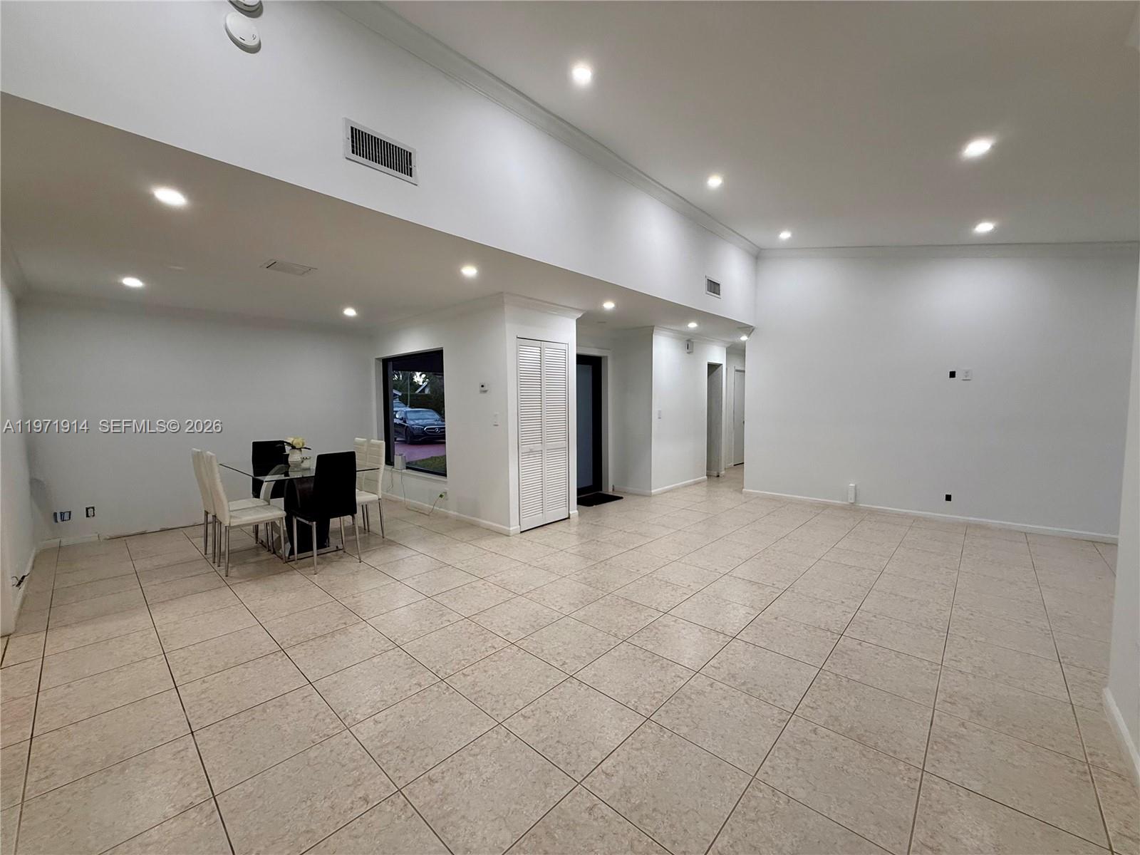 13253 Southwest 96th Terrace Miami, FL 33186 - Photo 11 of 18 a view of kitchen with furniture and a refrigerator