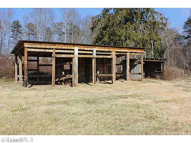 210 Taylor Road Pilot Mountain, NC 27041 - Photo 14 of 16 Parking Lot/Garage. Carport storage shed