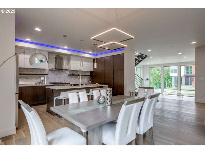14 Northwest Hood Street Camas, WA 98607 - Photo 11 of 36 a kitchen with stainless steel appliances granite countertop a sink a stove and refrigerator
