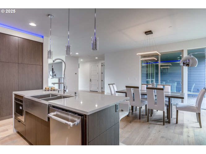 14 Northwest Hood Street Camas, WA 98607 - Photo 14 of 36 a kitchen with a table and chairs in it
