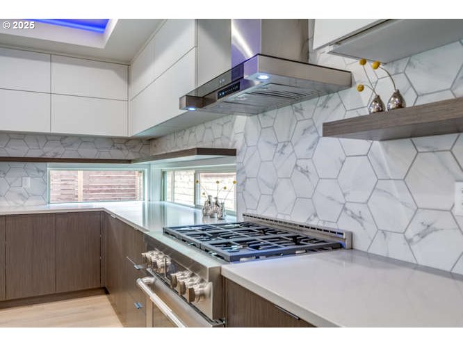 14 Northwest Hood Street Camas, WA 98607 - Photo 16 of 36 a white stove top oven sitting inside of a kitchen